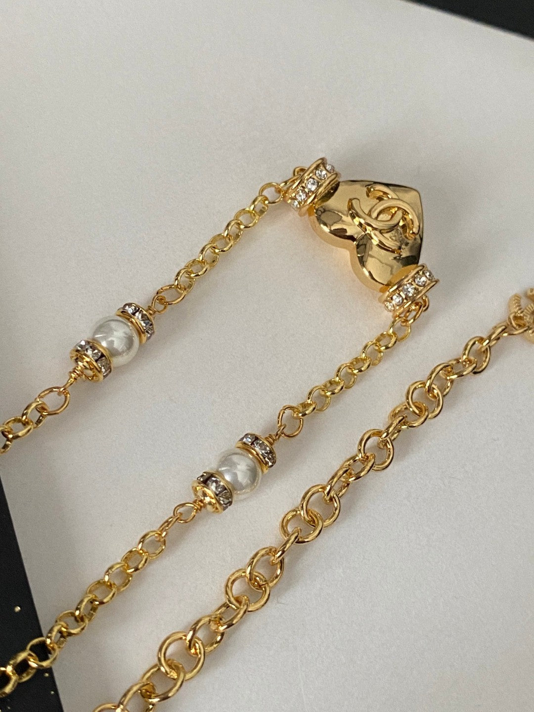 Martin Graham pendant necklace in polished metal-tone – front product view