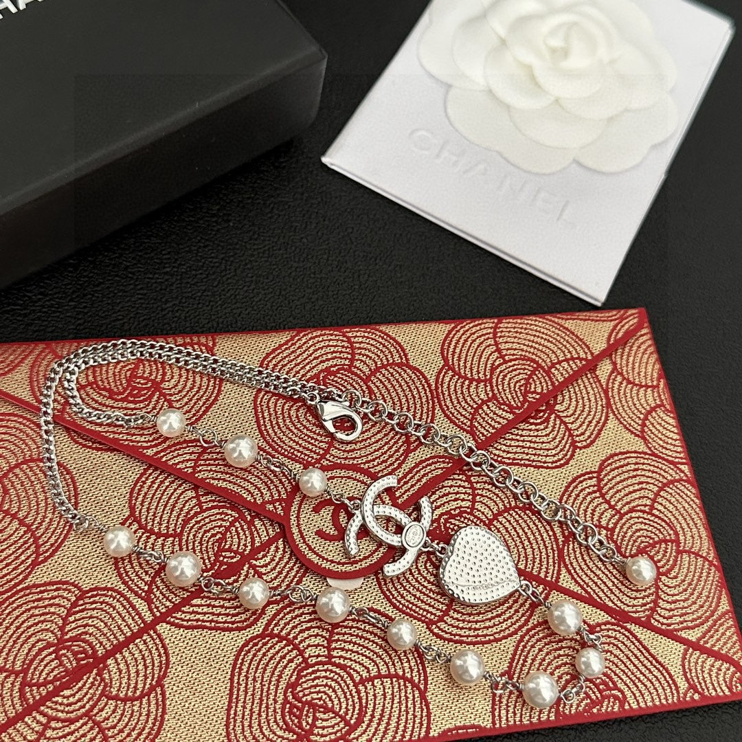 Martin Graham pendant necklace in polished metal-tone – styled product view