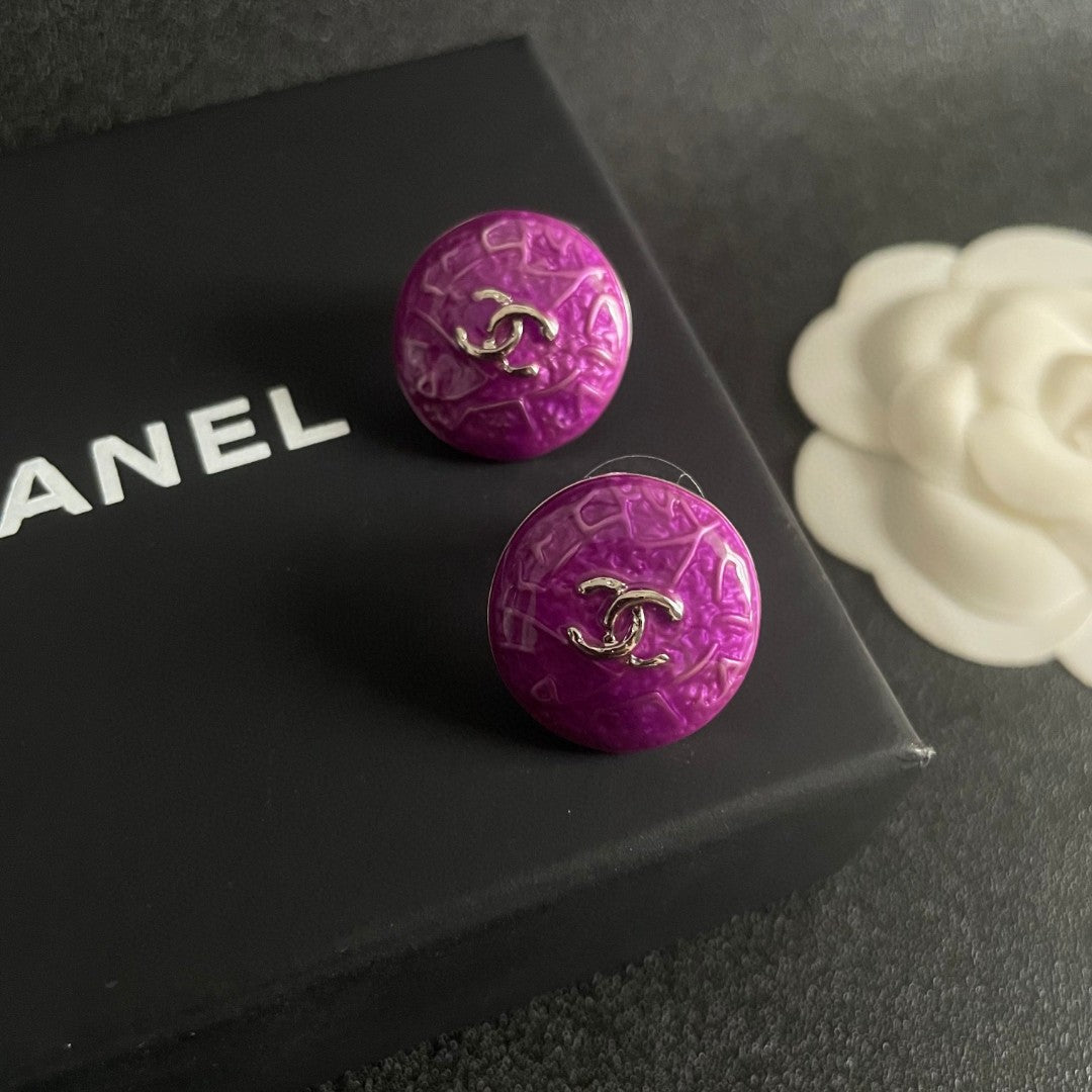 Martin Graham stud earrings in polished metal-tone – detail view