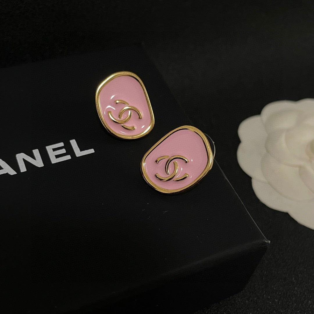 Martin Graham stud earrings in polished metal-tone – detail view