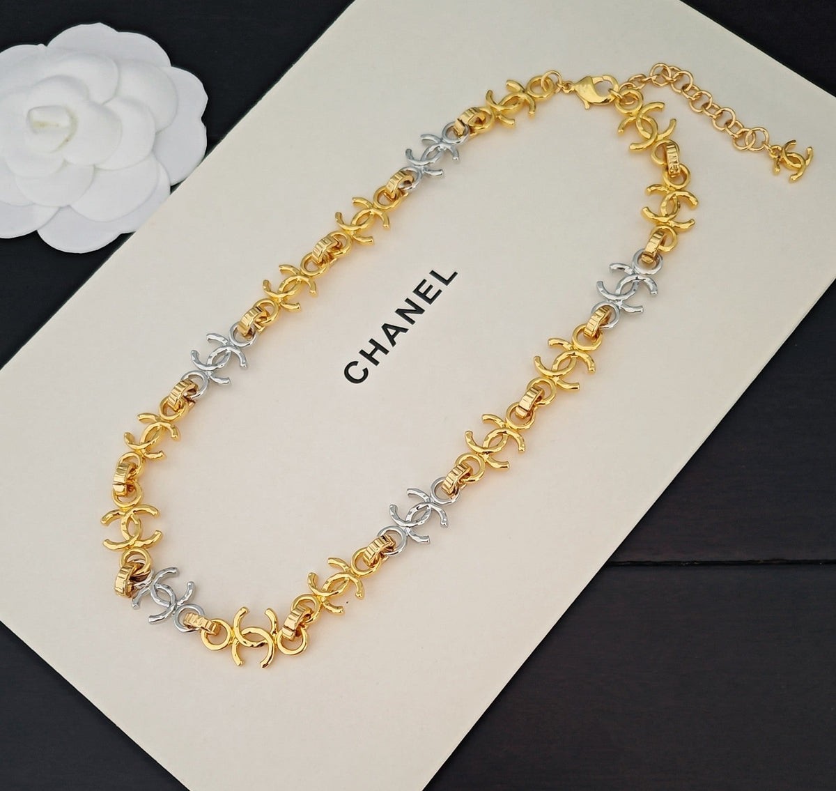 Martin Graham pendant necklace in polished metal-tone – close-up detail