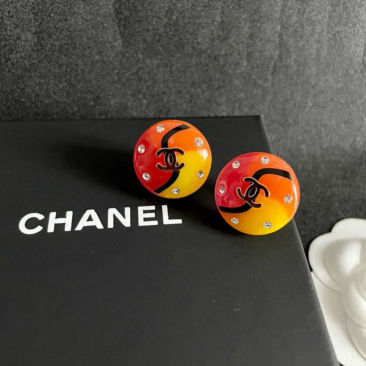 Martin Graham stud earrings in polished metal-tone – detail view