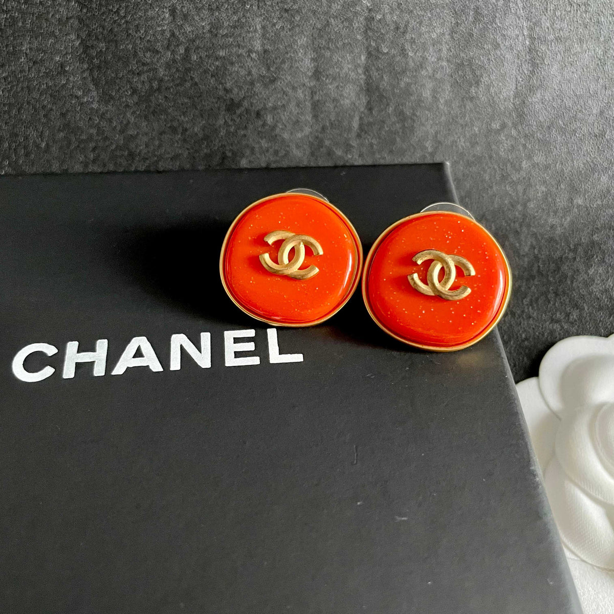 Martin Graham stud earrings in polished metal-tone – detail view