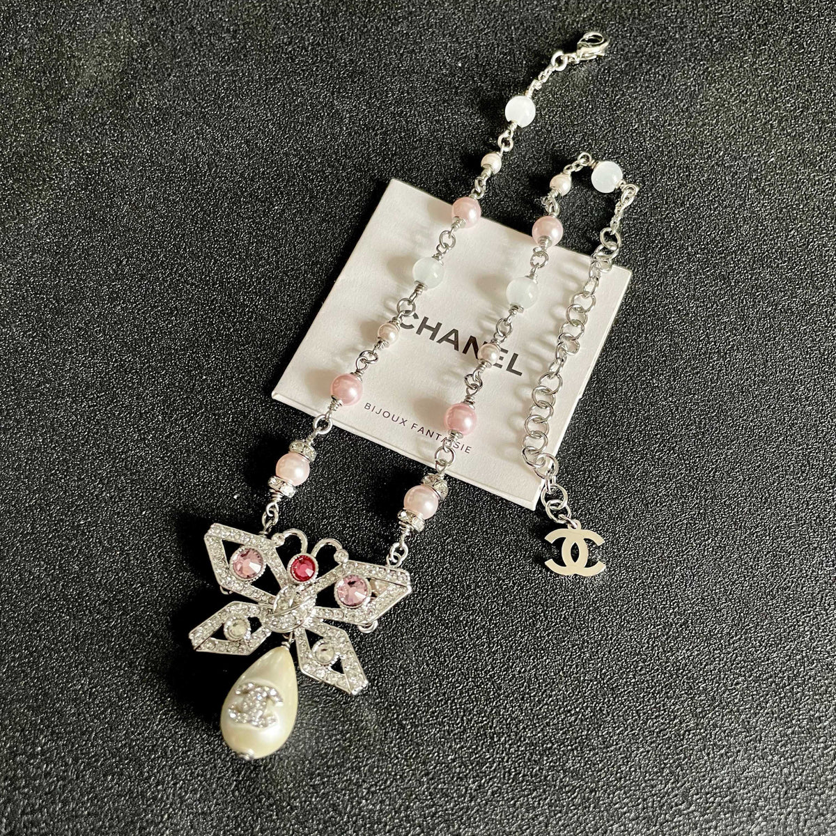 Martin Graham pendant necklace in polished metal-tone – detail view