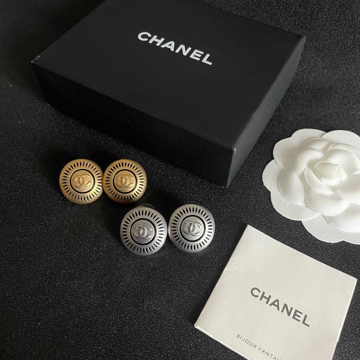 Martin Graham stud earrings in polished metal-tone – side detail