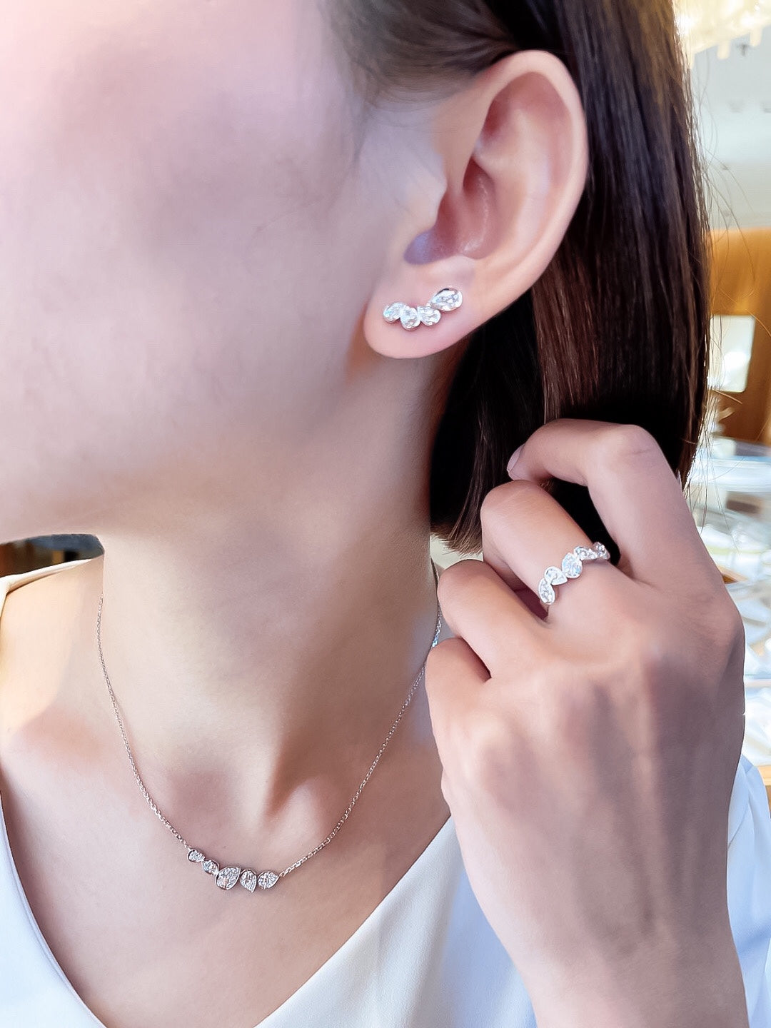 Martin Graham earrings in polished metal-tone – front product view