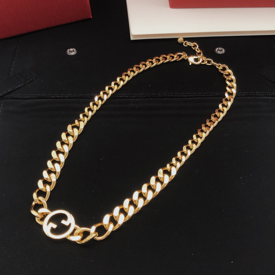 Martin Graham pendant necklace in polished metal-tone – close-up detail