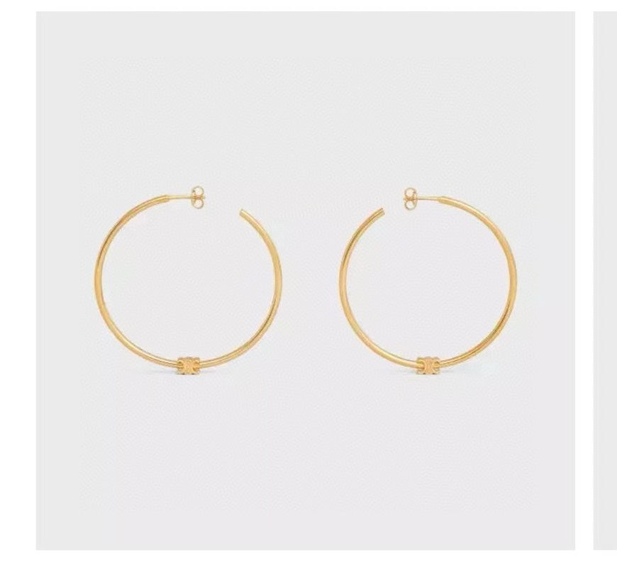 Martin Graham earrings in polished metal-tone – detail view