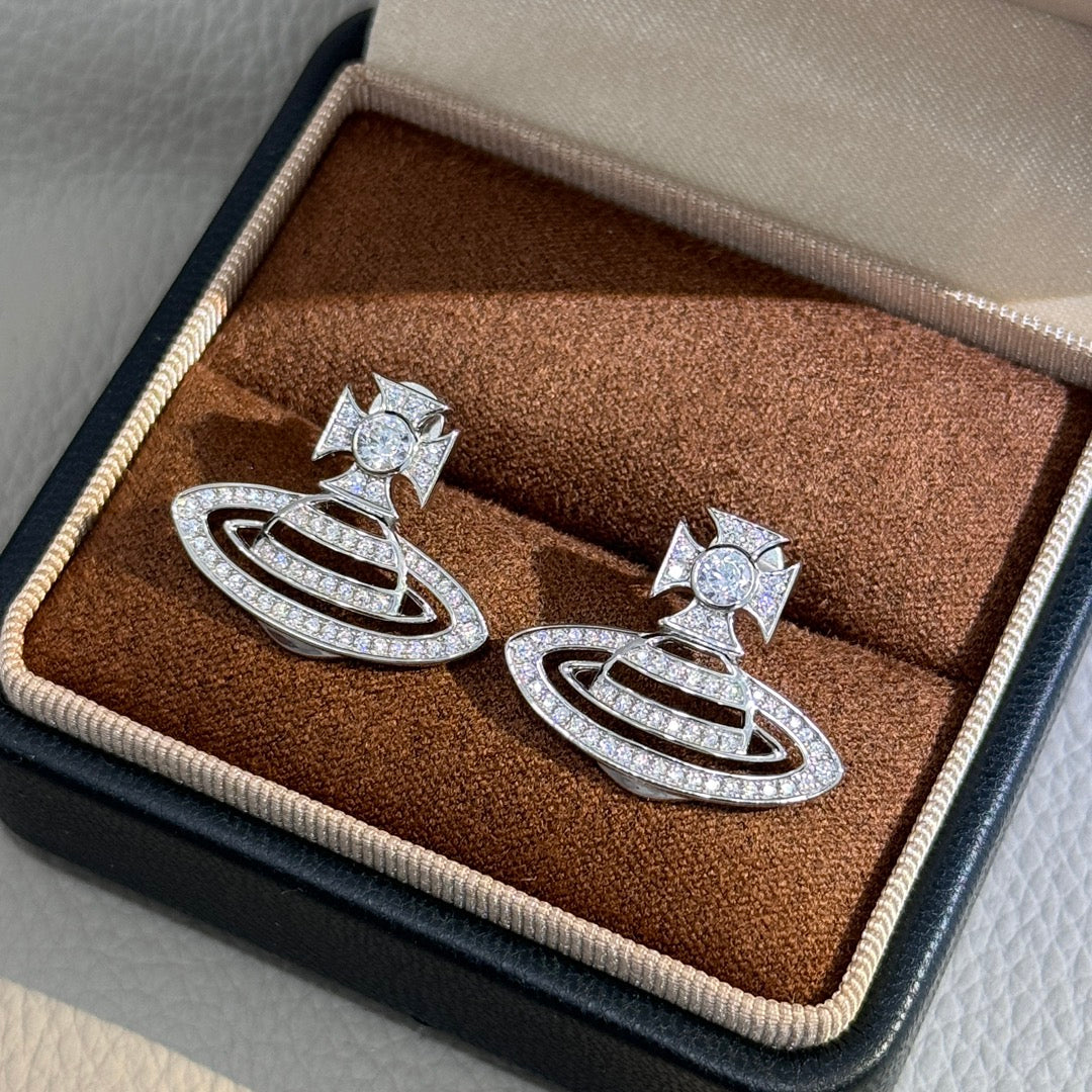 Martin Graham stud earrings in polished metal-tone – detail view
