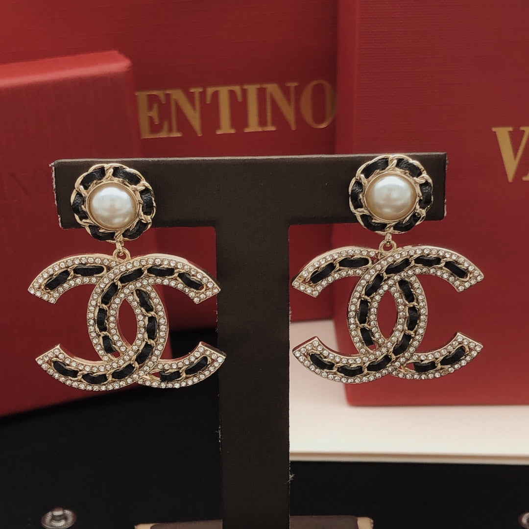 Martin Graham earrings in polished metal-tone – detail view