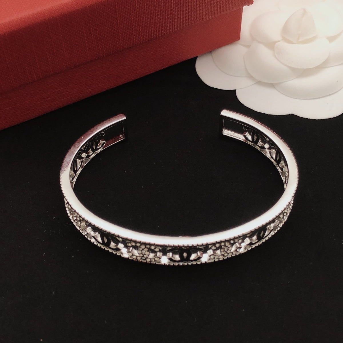 Martin Graham bangle in polished metal-tone – close-up detail