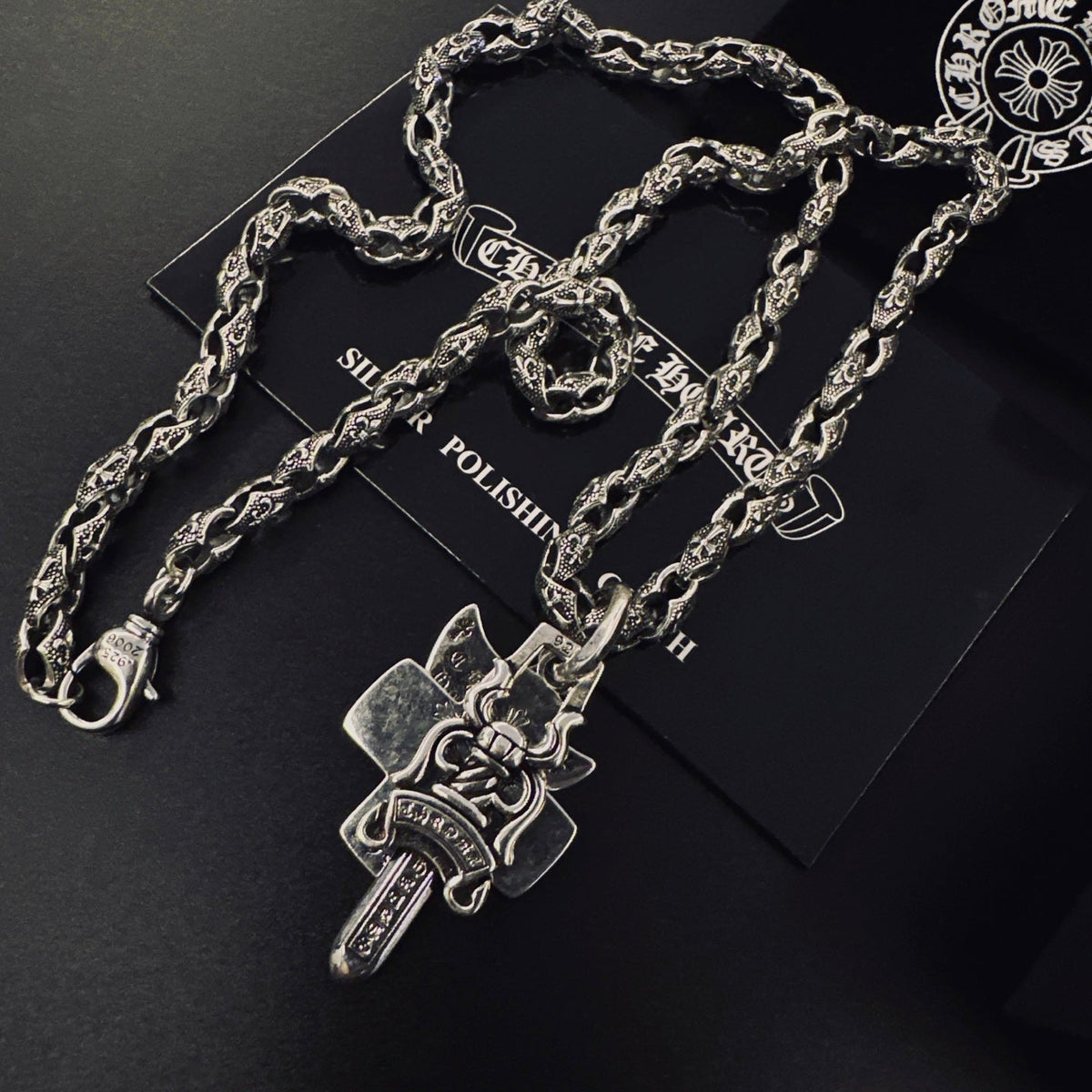 Martin Graham pendant necklace in polished metal-tone – detail view