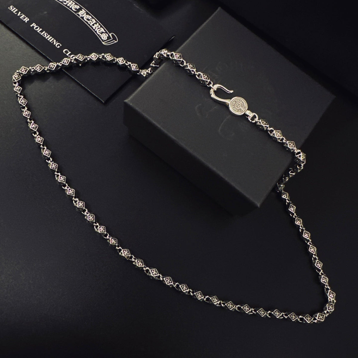 Martin Graham pendant necklace in polished metal-tone – front product view