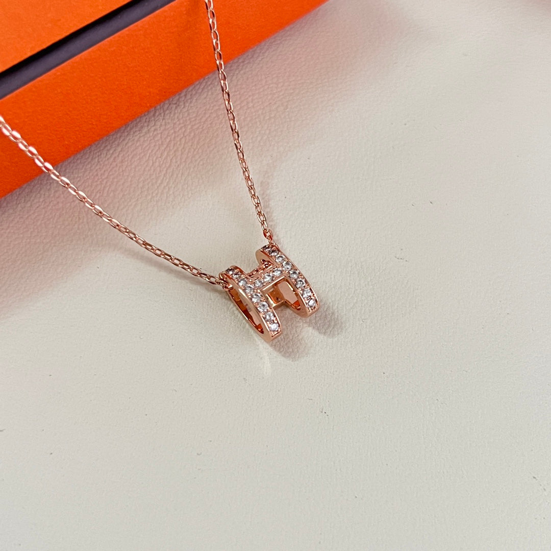 Martin Graham pendant necklace in polished metal-tone – styled product view