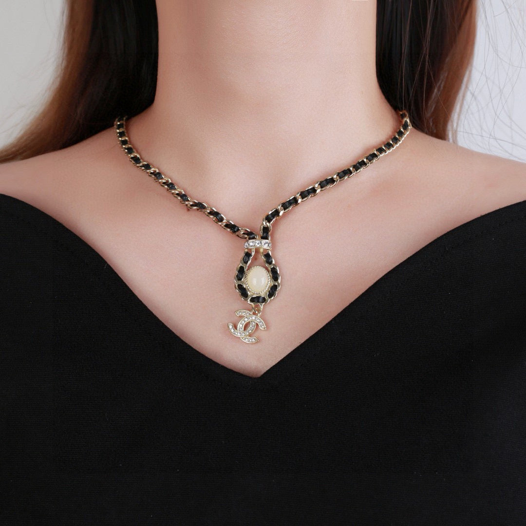 Martin Graham pendant necklace in polished metal-tone – styled product view