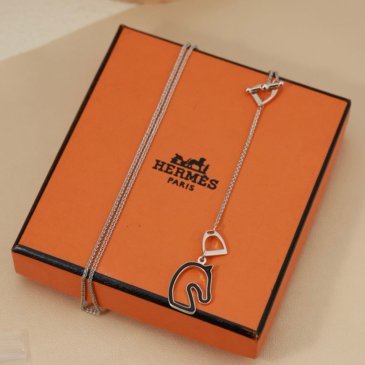 Martin Graham pendant necklace in polished metal-tone – detail view
