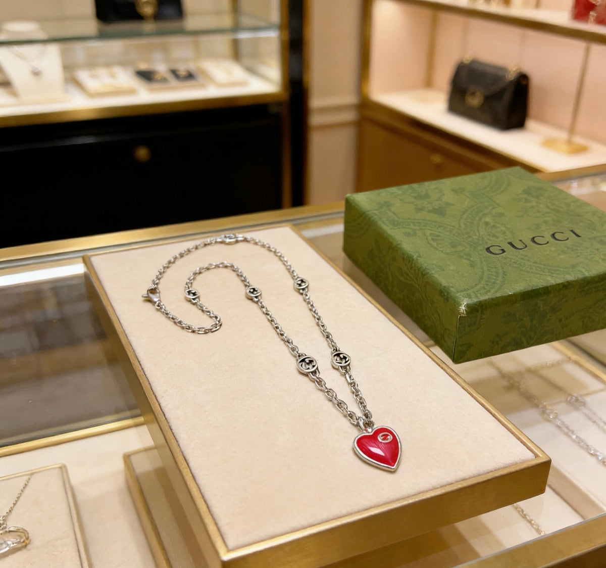 Martin Graham pendant necklace in polished metal-tone – detail view