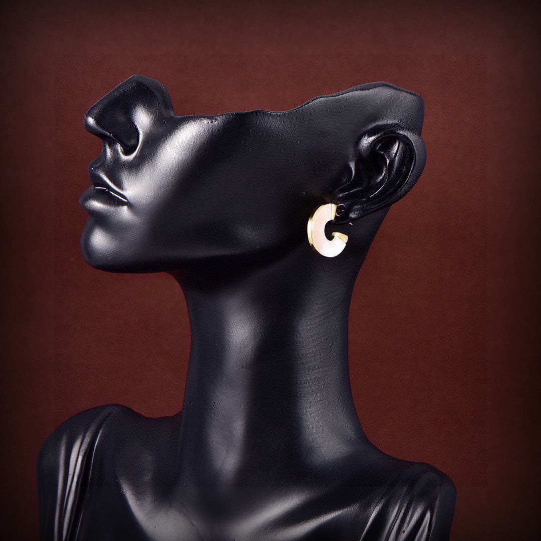Martin Graham stud earrings in polished metal-tone – front product view