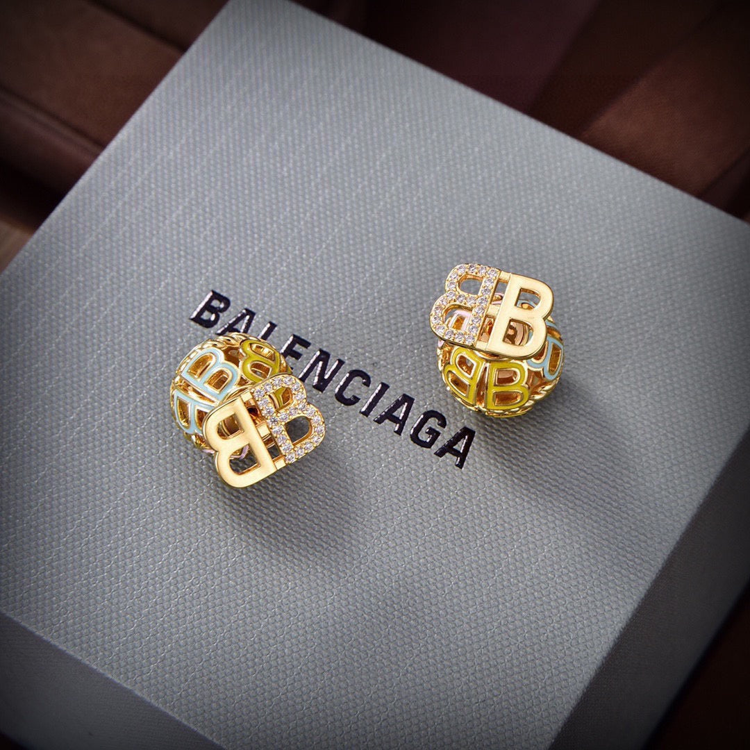 Martin Graham stud earrings in polished metal-tone – front product view