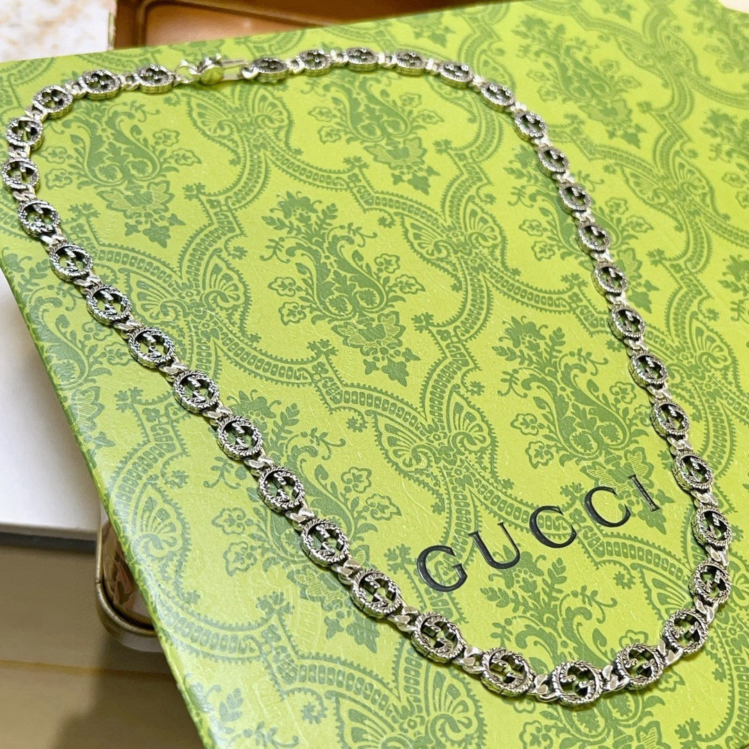 Martin Graham pendant necklace in polished metal-tone – front product view
