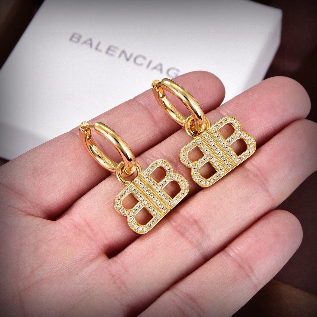 Martin Graham stud earrings in polished metal-tone – main product view