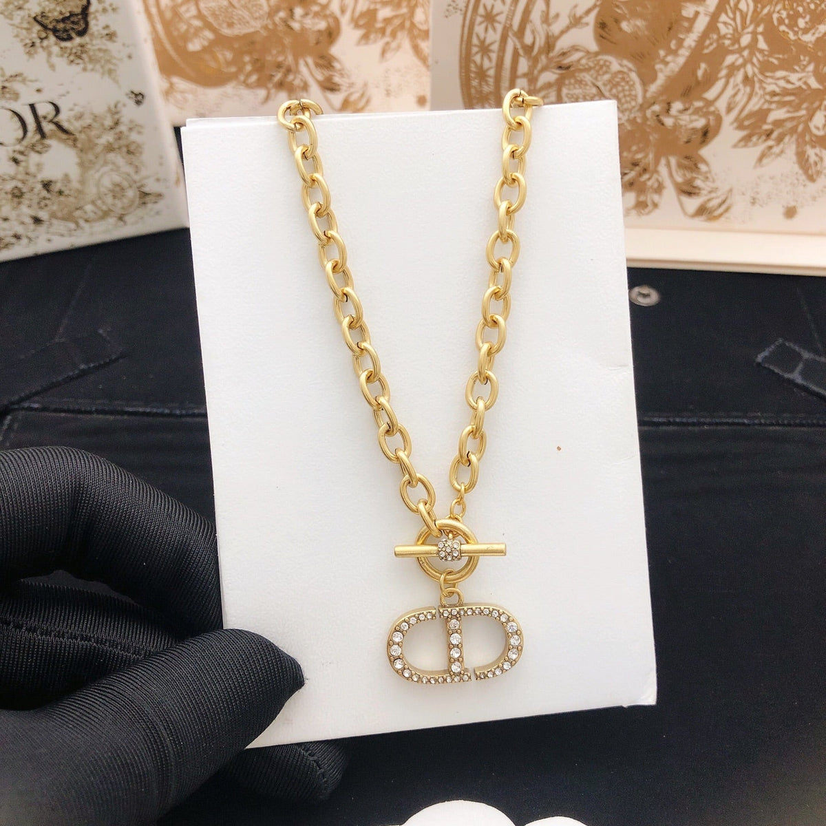 Martin Graham pendant necklace in polished metal-tone