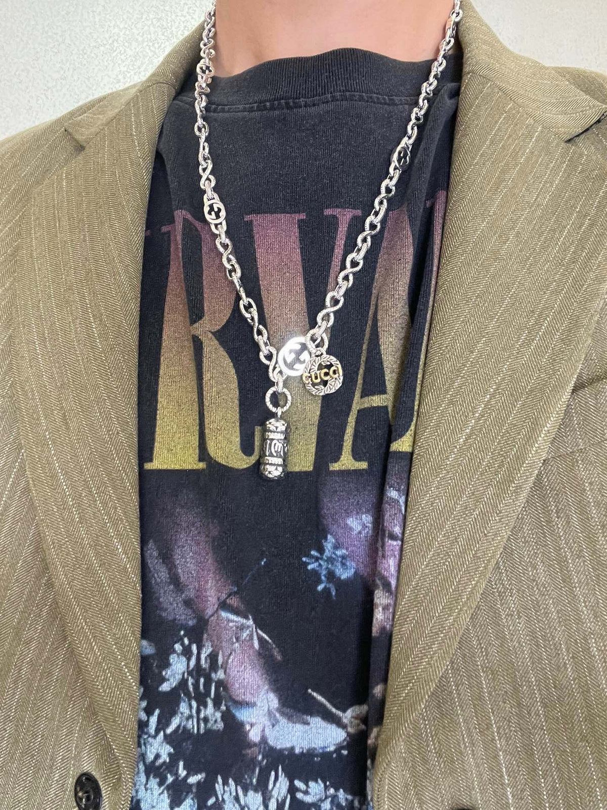 Martin Graham pendant necklace in polished metal-tone – detail view