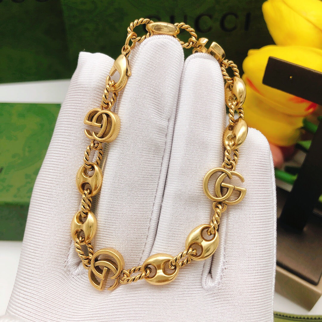 Martin Graham bracelet in polished metal-tone – close-up detail