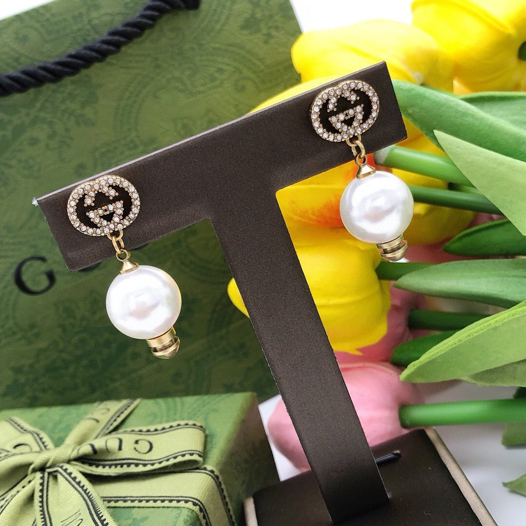 Martin Graham stud earrings in polished metal-tone – main product view