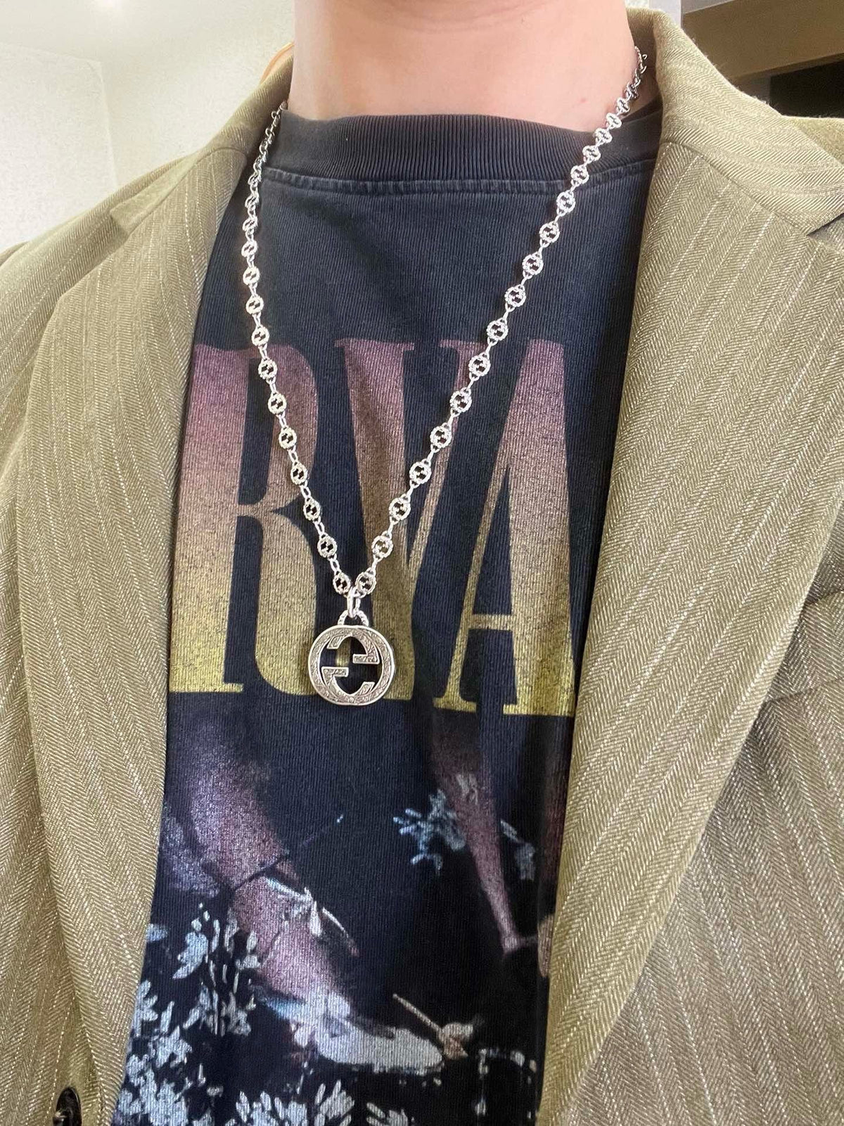 Martin Graham pendant necklace in polished metal-tone – detail view