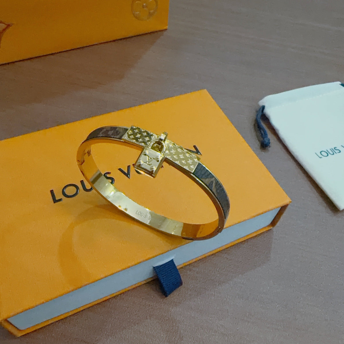 Martin Graham bangle in polished metal-tone – styled product view