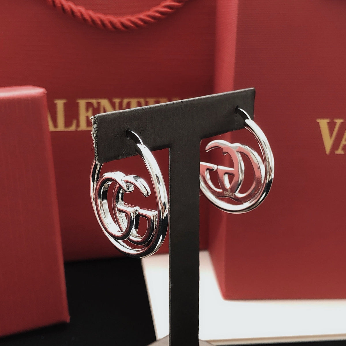 Martin Graham stud earrings in polished metal-tone – main product view