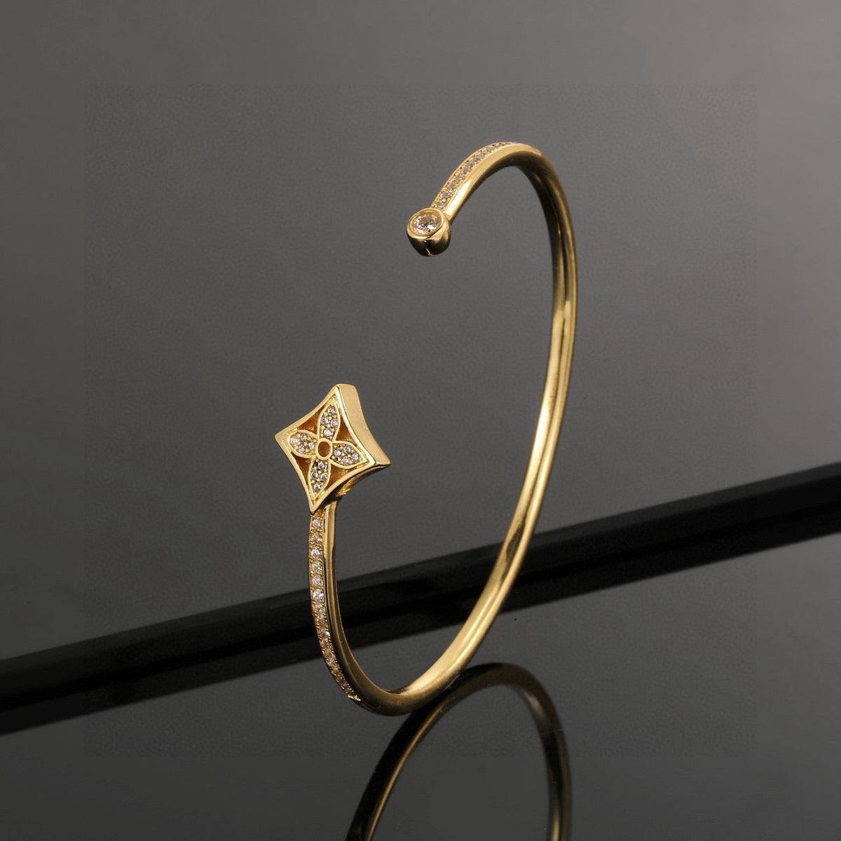 Martin Graham bangle in polished metal-tone – styled product view