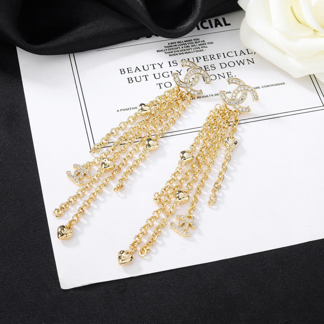 Martin Graham earrings in polished metal-tone – front product view