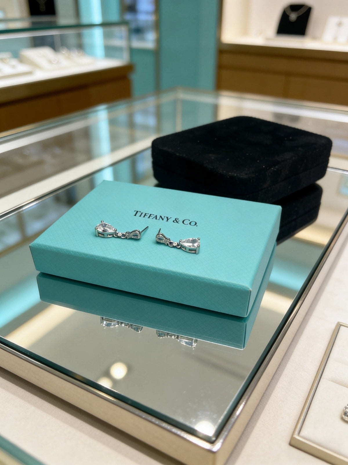 Martin Graham earrings in polished metal-tone – front product view