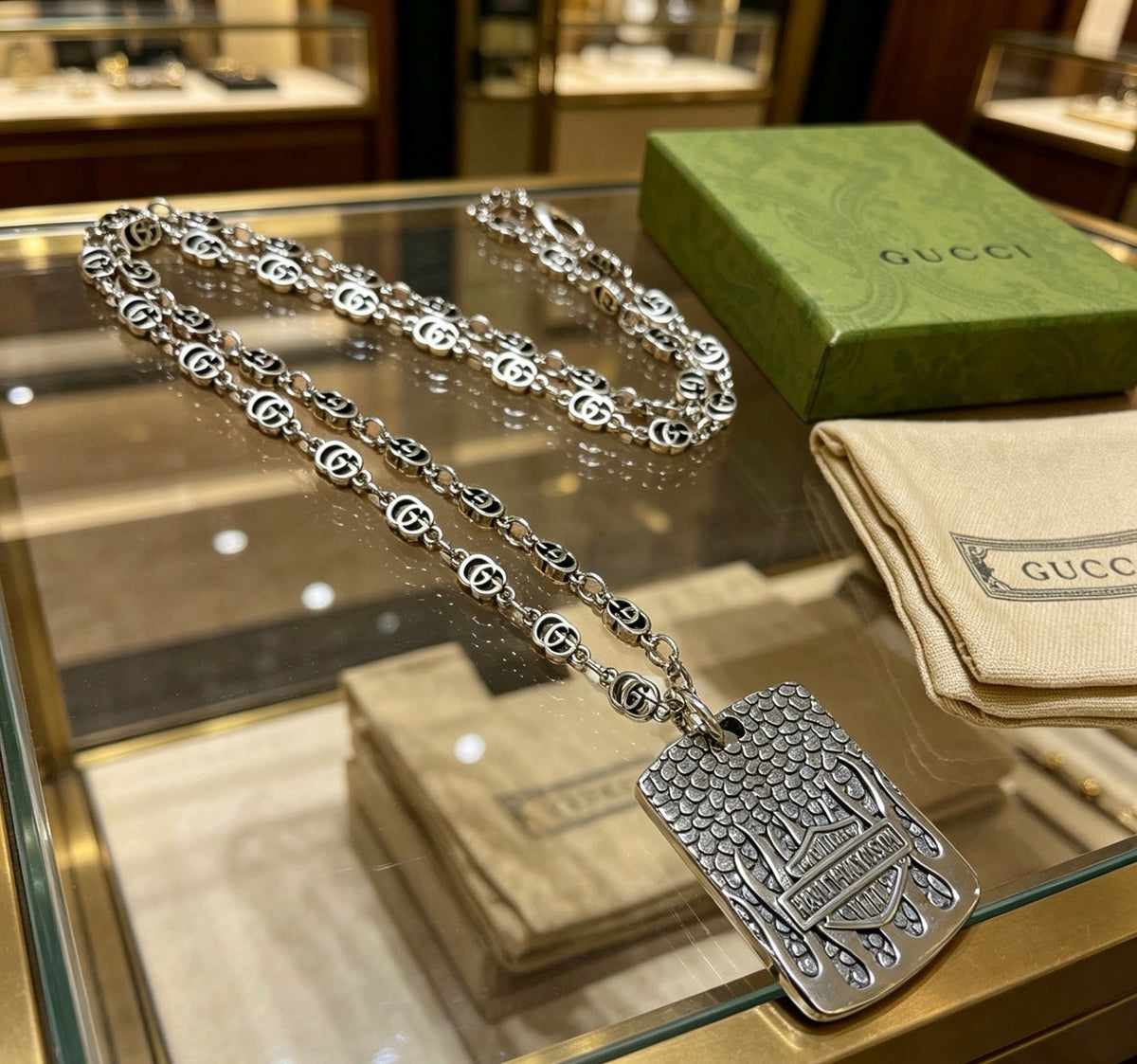 Martin Graham pendant necklace in polished metal-tone – detail view