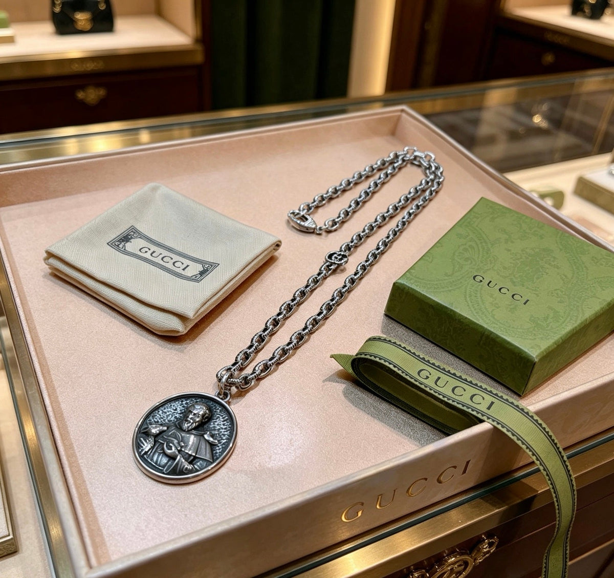 Martin Graham pendant necklace in polished metal-tone – detail view