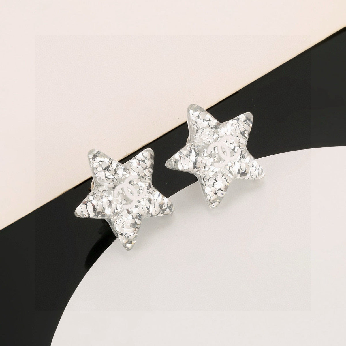 Martin Graham stud earrings in polished metal-tone – front product view