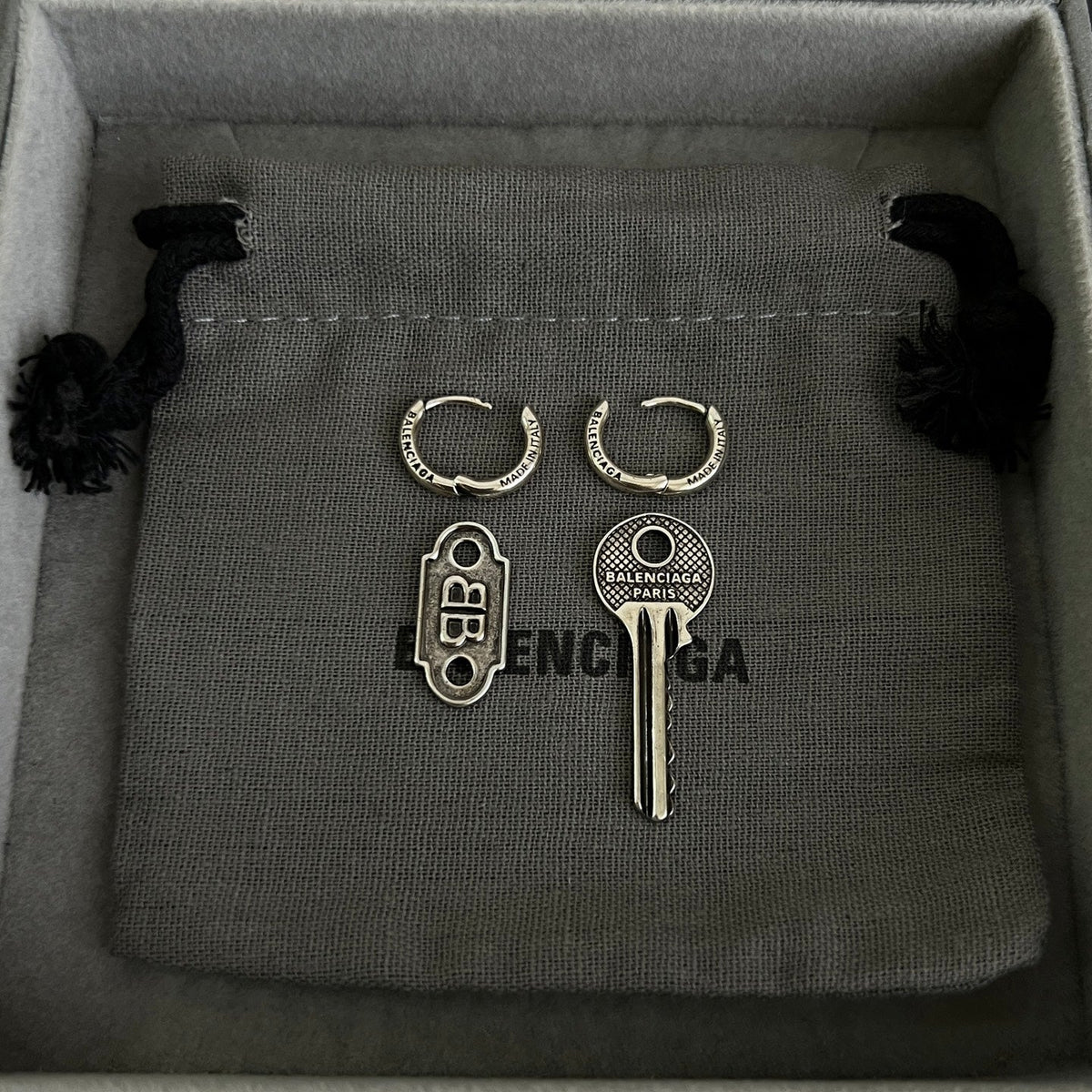 Martin Graham earrings in polished metal-tone – detail view