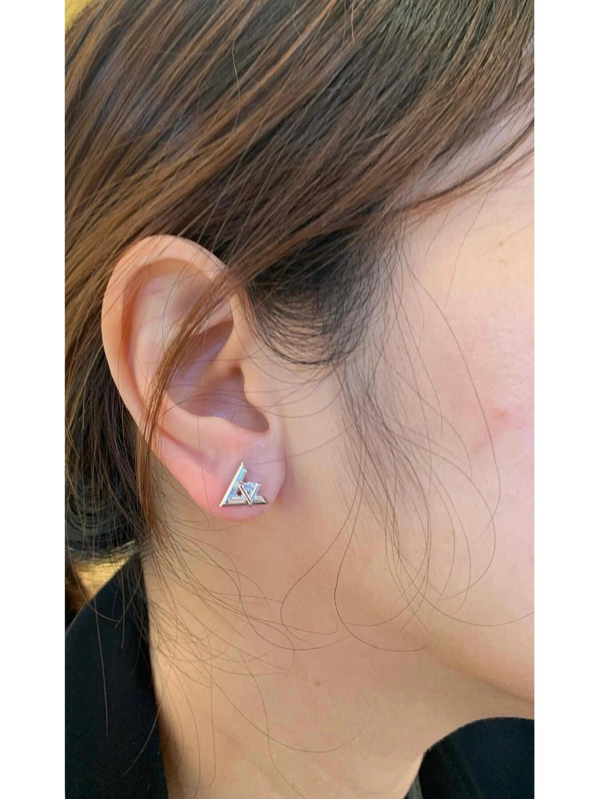 Martin Graham stud earrings in polished metal-tone – front product view