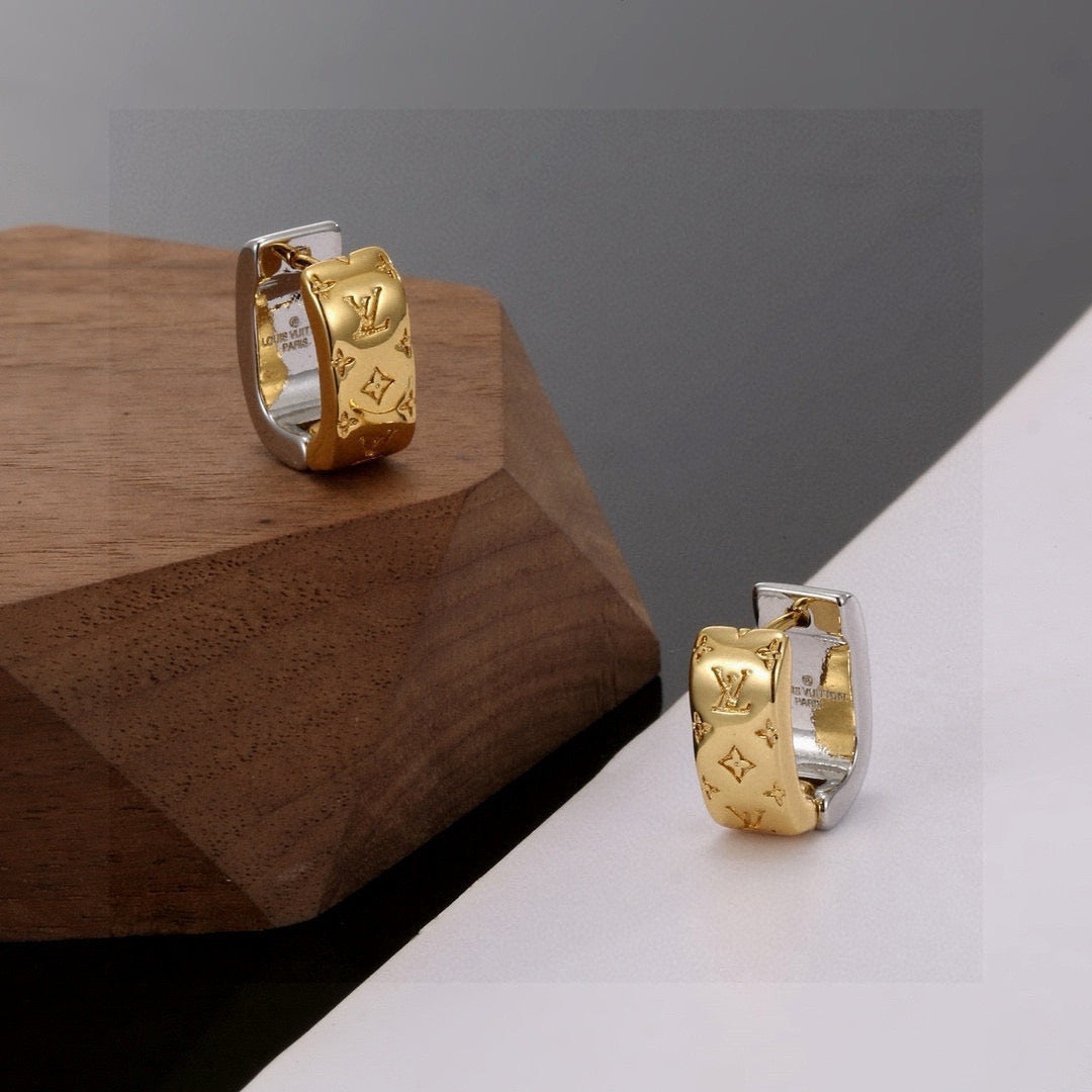 Martin Graham stud earrings in polished metal-tone – front product view