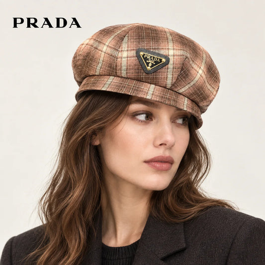 Prada hat worn by a female model, showing the hat shape and detailing.