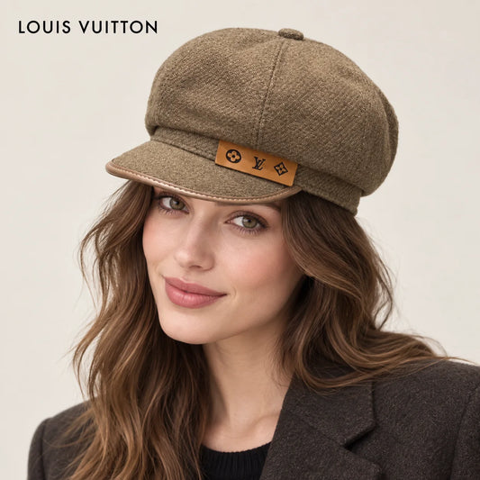Louis Vuitton hat worn by a female model, showing the hat shape and detailing.