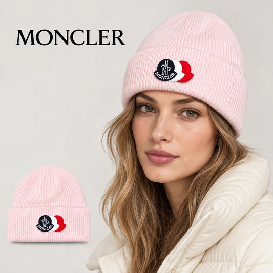 Moncler beanie worn by an adult female model, with product detail inset.