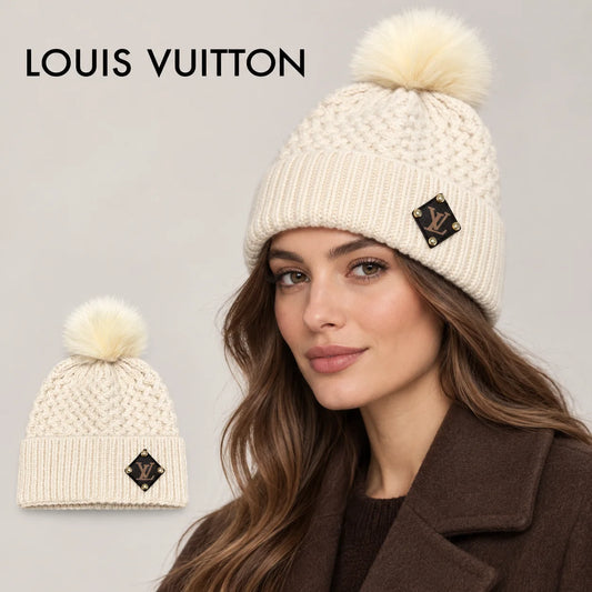 Louis Vuitton beanie worn by an adult female model, with product detail inset.