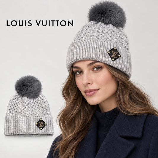 Louis Vuitton beanie worn by an adult female model, with product detail inset.