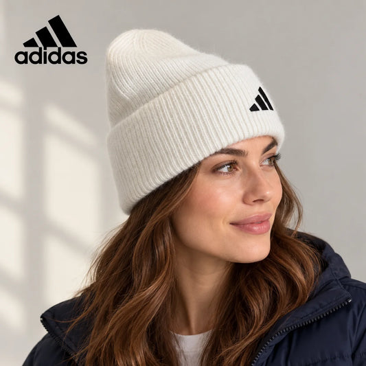 Adidas ribbed knit beanie worn by an adult female model