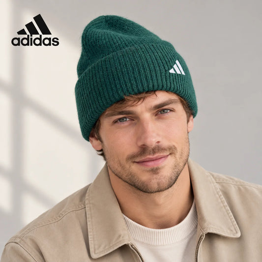 Adidas ribbed knit beanie worn by an adult male model