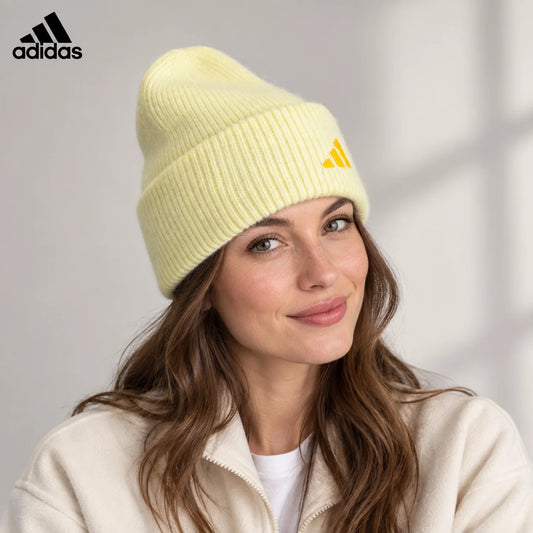 Adidas ribbed knit beanie worn by an adult female model