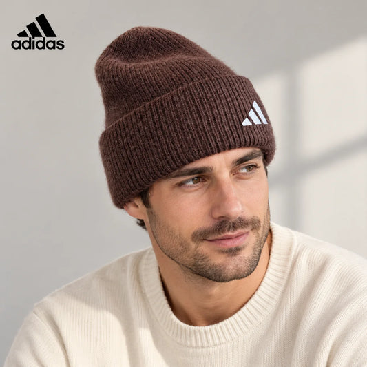 Adidas ribbed knit beanie worn by an adult male model